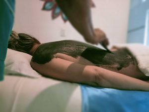 Tratamiento envolvente de fangoterapia